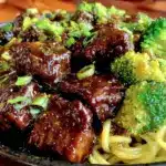 savory sticky beef noodles - featured image