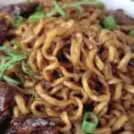savory sticky garlic chicken noodles - featured image