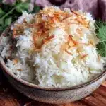 fluffy coconut rice stove top - featured image