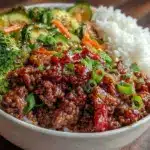 spicy ground beef stir-fry bowl meal prep - featured image